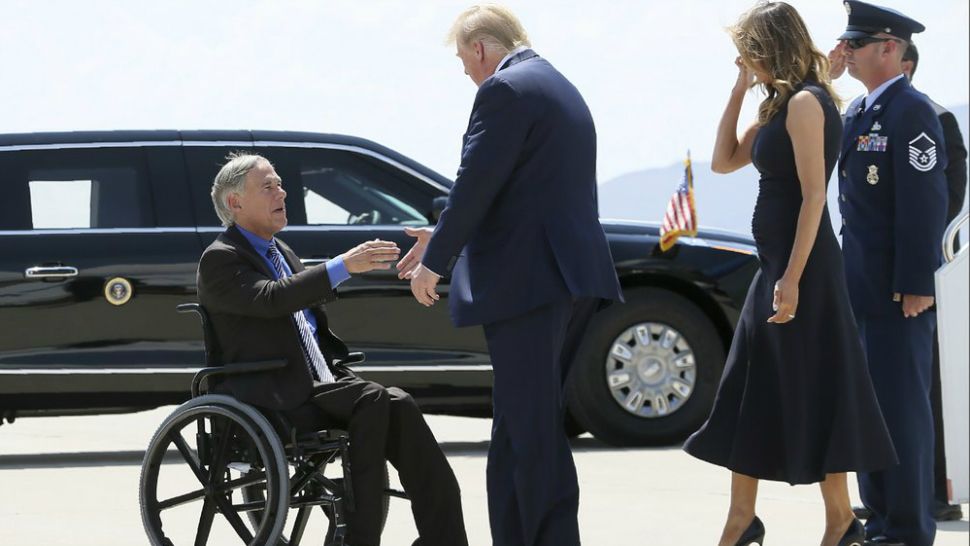 FILE - In this Aug. 7, 2019 file photo, President Donald Trump and Melania Trump greet Texas Gov. Greg Abbott after arriving in El Paso, Texas. Abbott says the state will reject the re-settlement of new refugees, becoming the first state known to do so under a recent Trump administration order. In a letter released Friday, Jan, 10, 2020, Abbott wrote that Texas "has been left by Congress to deal with disproportionate migration issues resulting from a broken federal immigration system." He added that Texas, which typically takes in thousands of refugees each year, has done "more than its share." Governors in 42 other states have said they will consent to allowing in more refugees, according to the Lutheran Immigration and Refugee Service.(Mark Lambie/The El Paso Times via AP, File)
