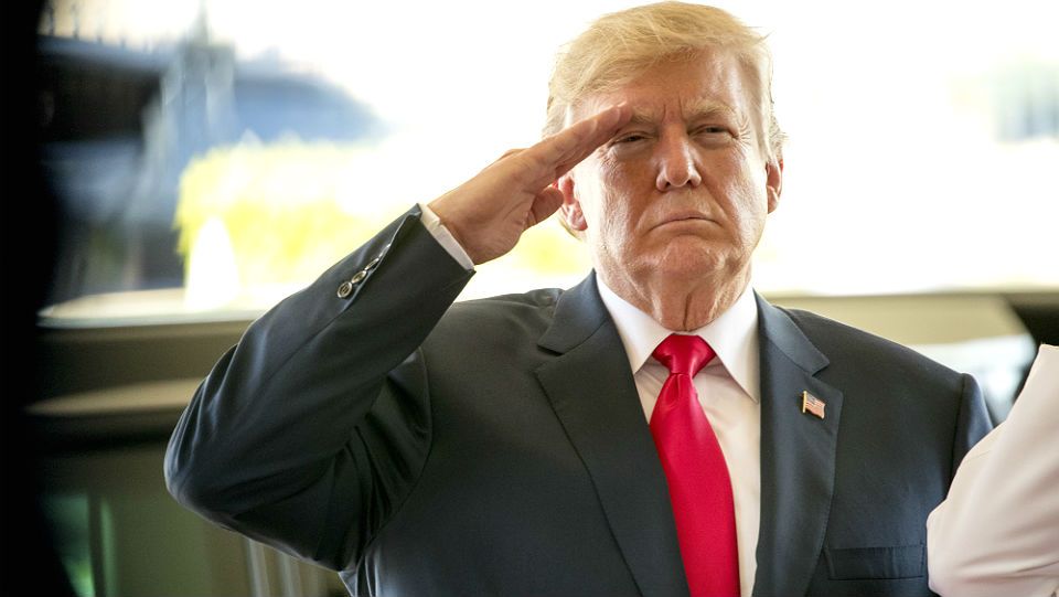 President Donald Trump salutes during a welcome ceremony at U.S. Pacific Command (PACOM), Friday, Nov. 3, 2017, in Aiea, Hawaii. Trump begins a 5 country trip through Asia traveling to Japan, South Korea, China, Vietnam and the Philippians. (AP Photo/Andrew Harnik)