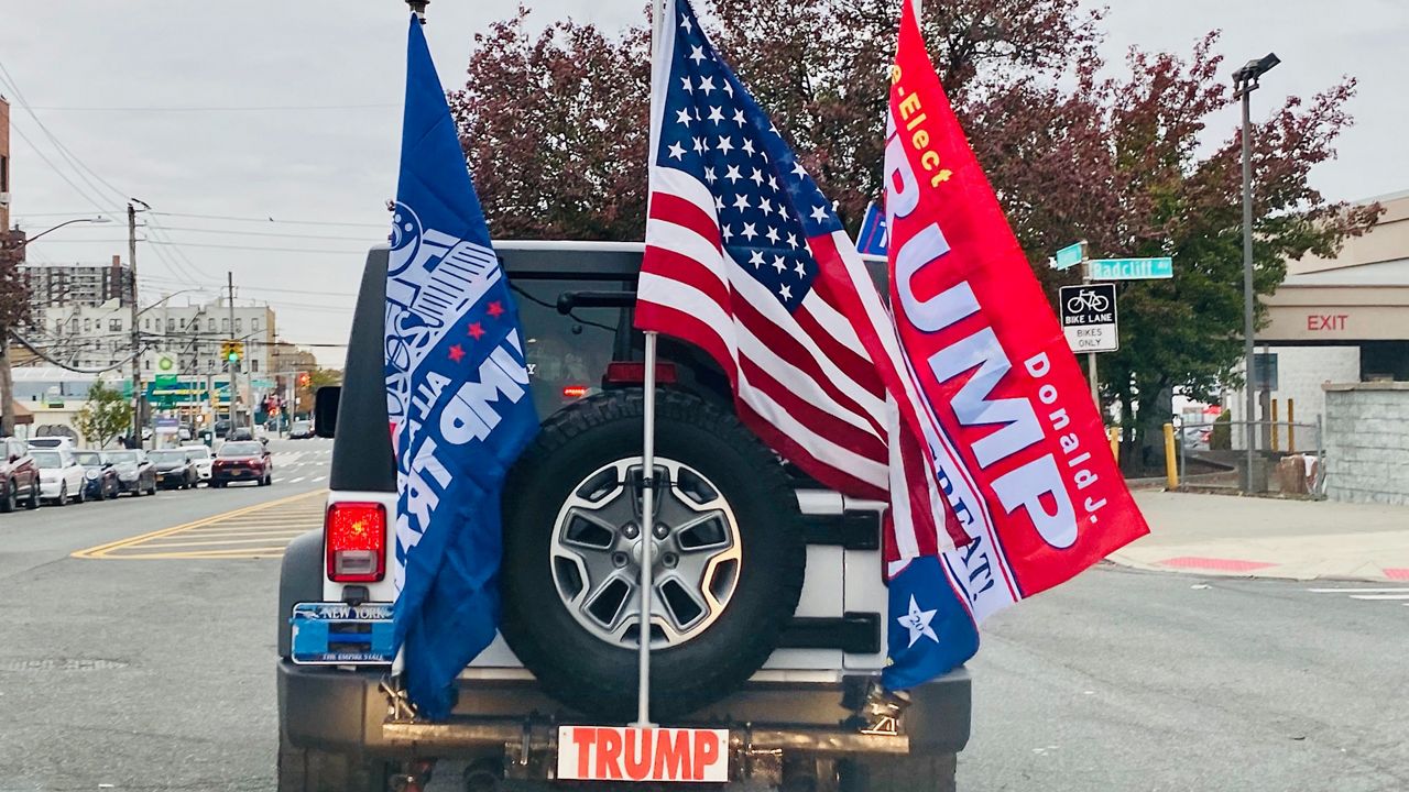 Car in a Trump caravan