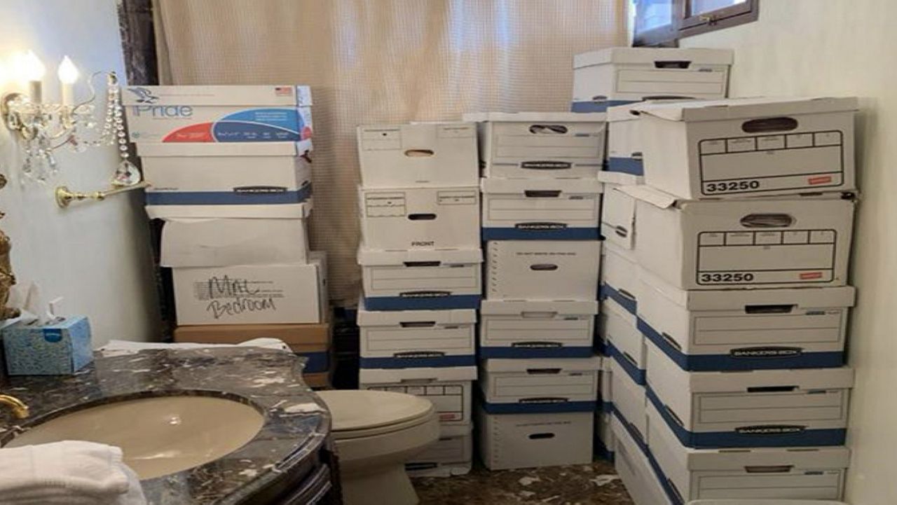 This image, contained in the indictment against former President Donald Trump, shows boxes of records stored in a bathroom and shower in the Lake Room at Trump's Mar-a-Lago estate in Palm Beach, Fla. (Justice Department via AP)