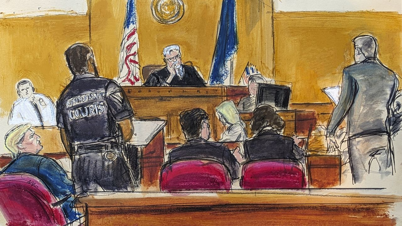 Donald Trump, far left, watches as jury foreperson No. 1 delivers guilty verdicts with Judge Juan Merchan listening on the bench in Manhattan Criminal Court, Thursday, May 30, 2024, in New York. (Elizabeth Williams via AP)