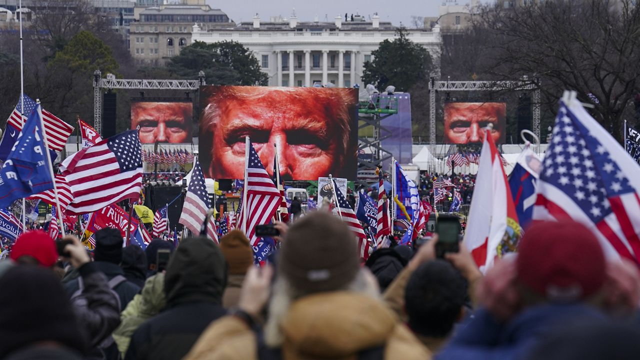 Trump supporters participate in a rally Jan. 6, 2021, in Washington. (AP Photo/John Minchillo)