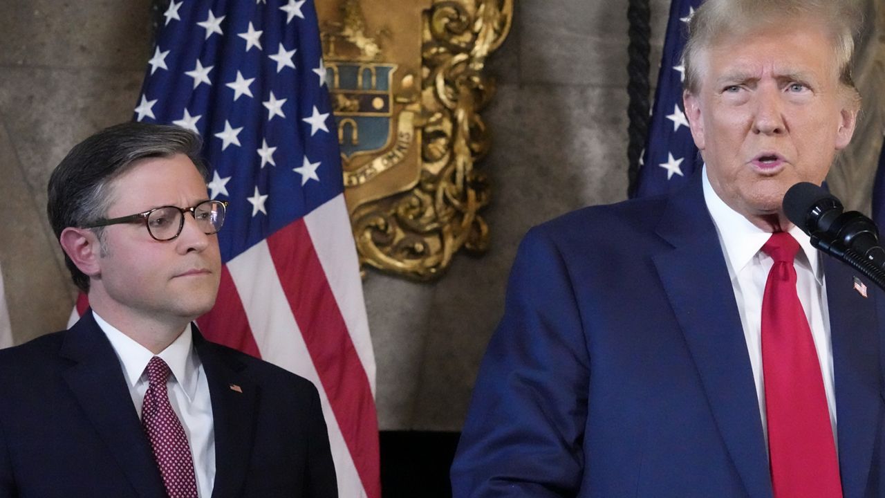 Republican presidential candidate former President Donald Trump speaks as Speaker of the House Mike Johnson, R-La., listens during a news conference, Friday, April 12, 2024, at Mar-a-Lago in Palm Beach, Fla. (AP Photo/Wilfredo Lee)