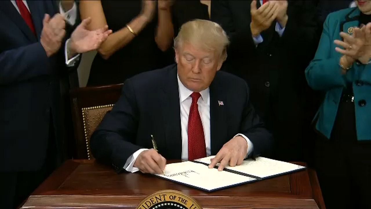 Trump signs executive order on health care