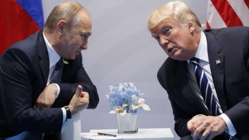 Presidents Donald Trump and Vladimir Putin will discuss relations between the U.S. and Russia, among other things, in Finland in July, according to the White House. (File photo)