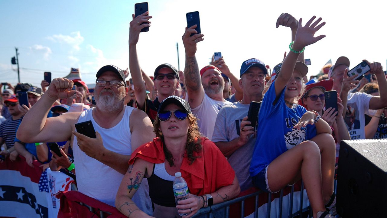 Supporters cheer as Republican presidential candidate former President Donald Trump arrives for a campaign rally, Saturday, July 13, 2024, in Butler, Pa. (AP Photo/Evan Vucci, File)