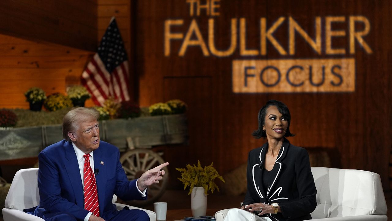 Republican presidential nominee and former President Donald Trump speaks during a break in a Fox News town hall with Harris Faulkner at The Reid Barn, Tuesday, Oct. 15, 2024, in Cumming, Ga. (AP Photo/Julia Demaree Nikhinson)