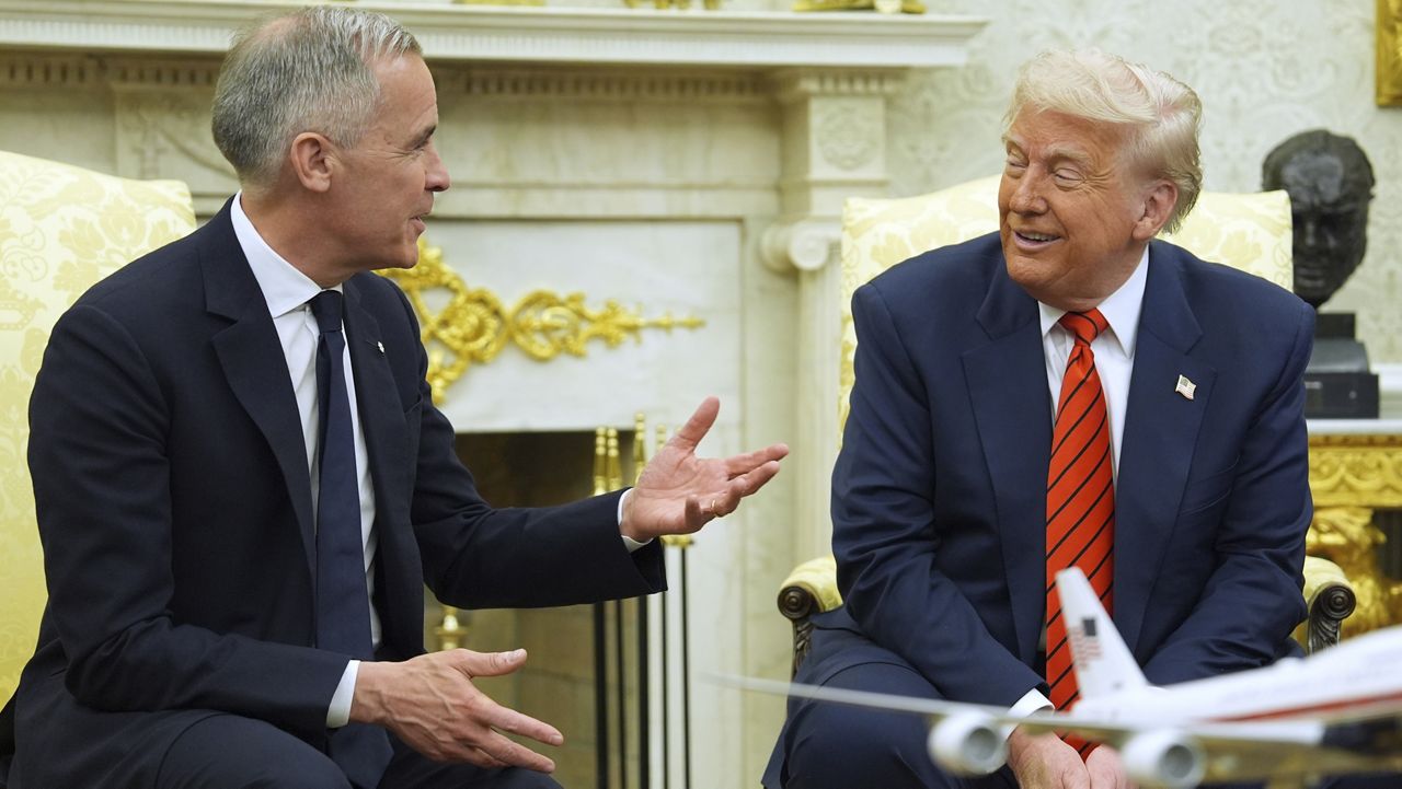 President Donald Trump meets Canadian Prime Minister Mark Carney in the Oval Office of the White House, Tuesday, May 6, 2025, in Washington. (AP Photo/Evan Vucci)