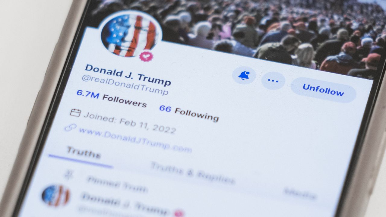 The Truth Social account for former President Donald Trump is seen on a mobile device, Wednesday, March 20, 2024, in New York. (AP Photo/John Minchillo)