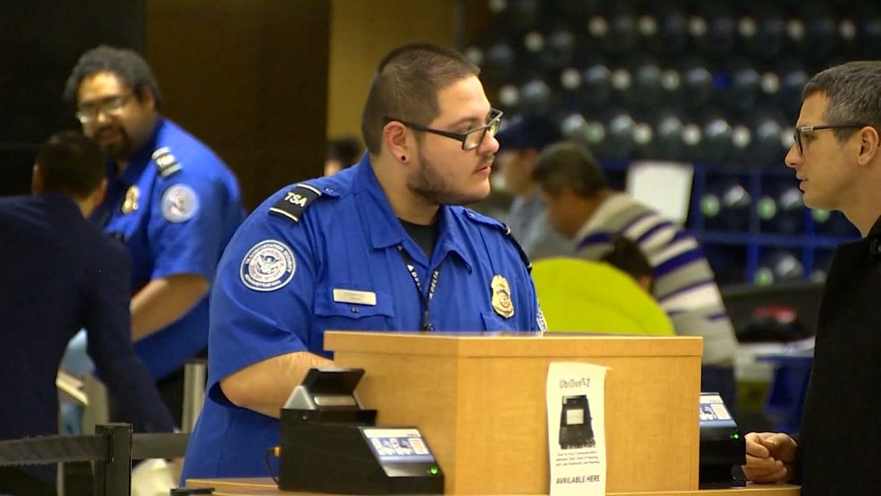 TSA is considering further changes to its screening system to further minimize the risk and to limit physical interactions in the security checkpoint. (File photo)