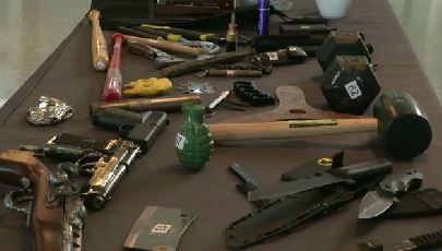 File photo of guns found by TSA. 