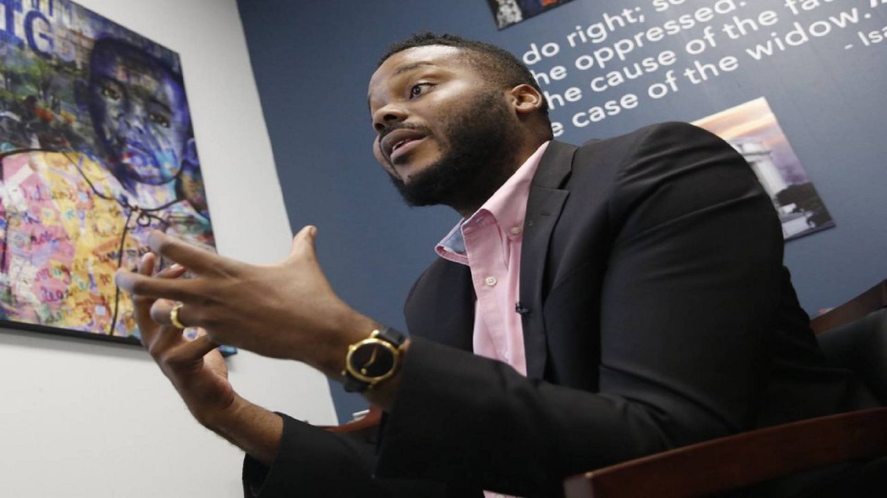  In this Aug. 14, 2019, file photo, then-Stockton Mayor Michael Tubbs speaks during an interview in Stockton, Calif. A study of people in California who received $500 a month for free says they used it to pay off debt and get full-time jobs. A pair of independent researchers reviewed data from the first year of the study and released their finding on Wednesday, March 3, 2021. (AP Photo/Rich Pedroncelli, File)