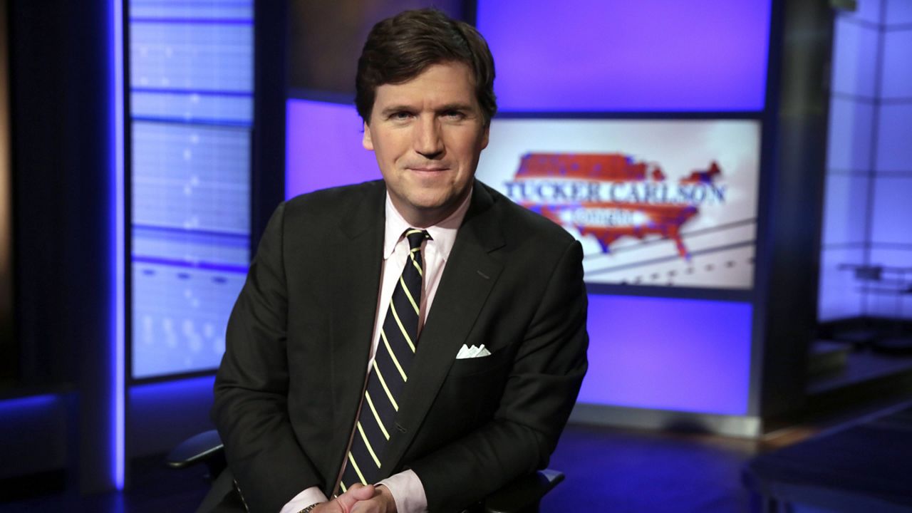 Tucker Carlson, host of "Tucker Carlson Tonight," poses for photos in a Fox News Channel studio on March 2, 2017, in New York. (AP Photo / Richard Drew)