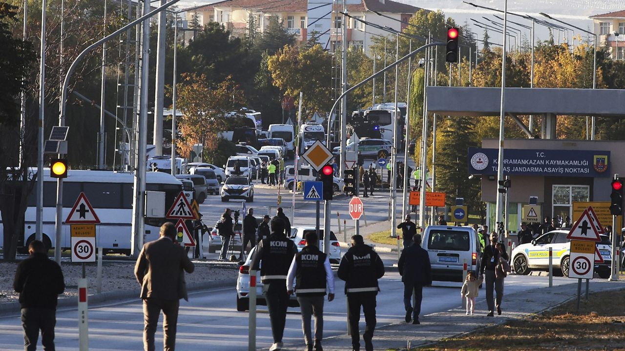 Emergency and security teams are deployed outside of Turkish Aerospace Industries Inc. at the outskirts of Ankara, Turkey, Wednesday, Oct. 23, 2024. (Yavuz Ozden/Dia Photo via AP)