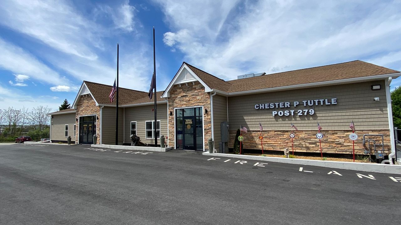 Chester P. Tuttle Post cuts ribbon on facility