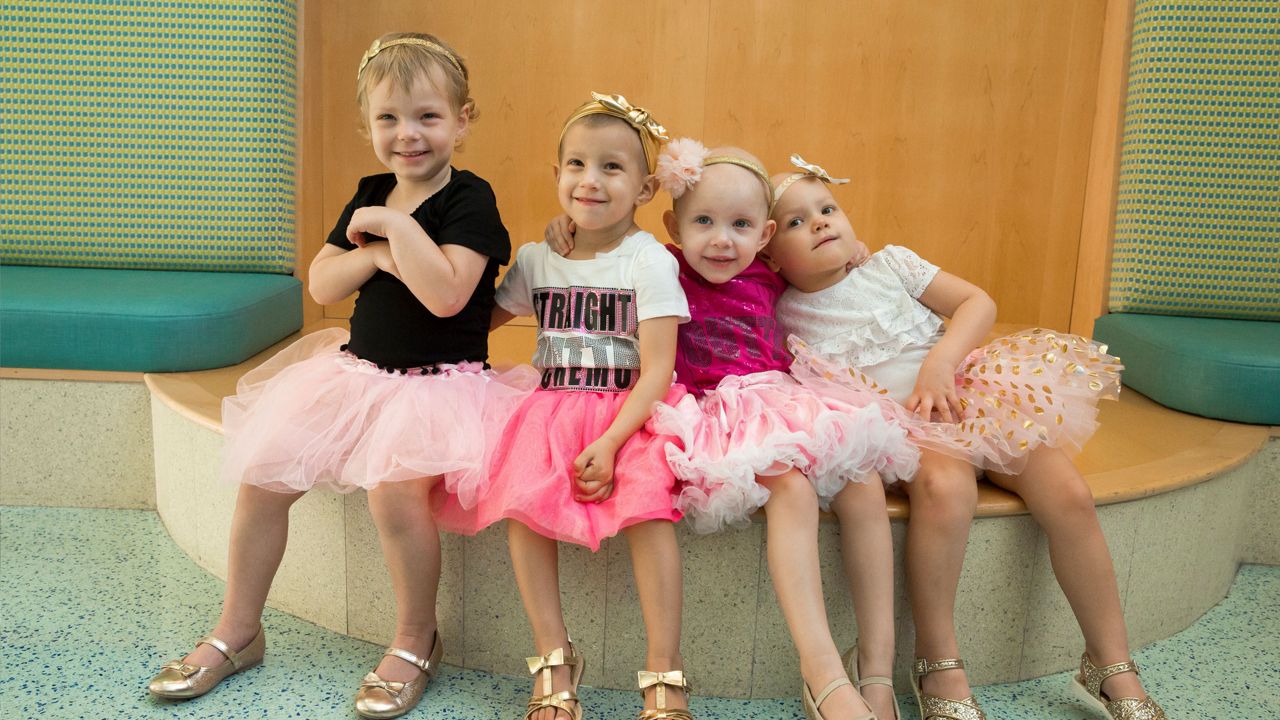 Celebrating National Childhood Cancer Awareness Month and "TuTu Tuesday", McKinley, Chloe, Lauren, and Avalynn, in the lobby of the hospital. The children are freinds from the Johns Hopkins All Children’s Cancer & Blood Disorders Institute.