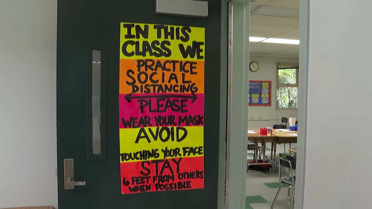 A sign hangs inside Monte Vista Elementary School in the Highland Park area of Los Angeles. (Spectrum News 1/Catalina Villegas)