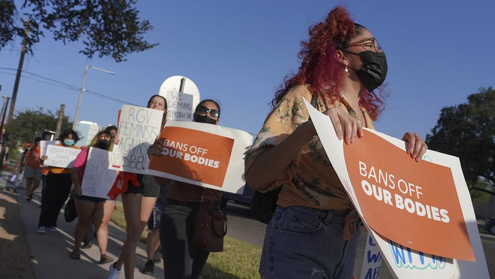 Abortion rights supporters gather to protest Texas SB 8 in front of Edinburg City Hall on Wednesday, Sept. 1, 2021, in Edinburg, Texas. (Joel Martinez/The Monitor via AP)