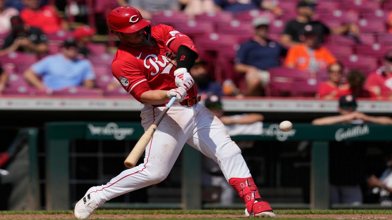 Cincinnati Reds' Ty France hits a home run during the seventh inning of a baseball game against the Houston Astros, Thursday, Sept. 5, 2024, in Cincinnati. (AP Photo/Carolyn Kaster)