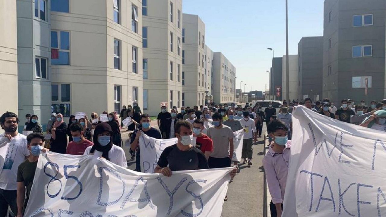 Afghan evacuees living at a United Arab Emirates facility protest their long stay and a lack of information from officials about when they'll leave.