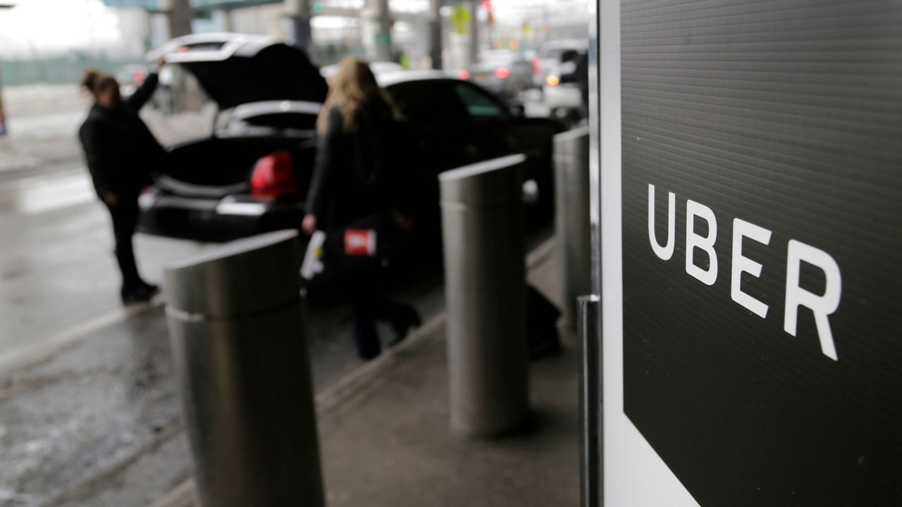 An Uber sign is displayed at the company's headquarters in San Francisco, Monday, Sept. 12, 2022.  (AP Photo/Jeff Chiu, File)