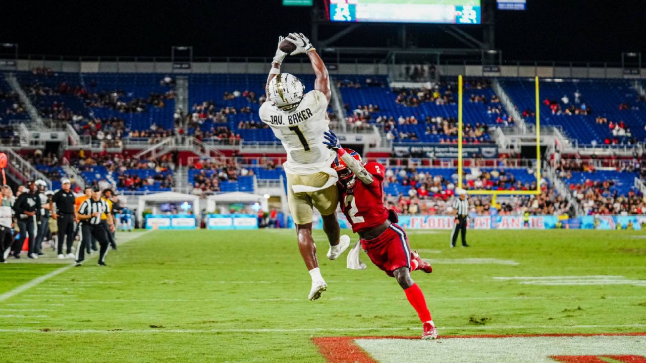 UCF wide receiver Javon Baker completes a catch from QB John Rhys Plumlee. (Photo/UCF Football)