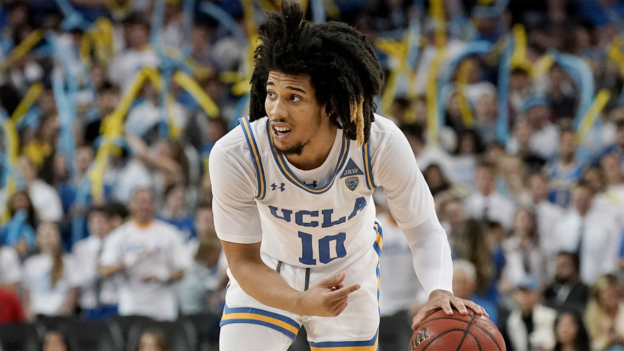 UCLA guard Tyger Campbell brings the ball down court during the second half of an NCAA college basketball game against Arizona in Los Angeles, Saturday, Feb. 29, 2020. UCLA won 69-64. (AP Photo/Chris Carlson)