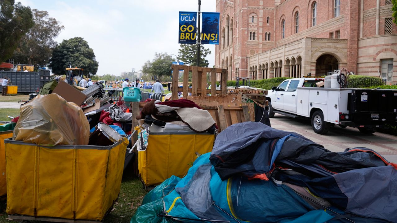 Tents and trash are left behind at the site of a pro-Palestinian encampment which was cleared by police overnight on the UCLA campus Thursday in Los Angeles. (AP Photo/Ashley Landis)