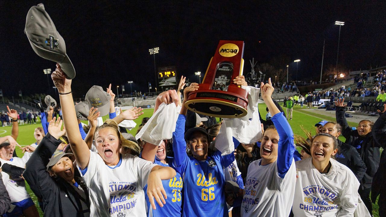UCLA players celebrates after defeating North Carolina to win the NCAA women's soccer tournament final in Cary, N.C., Monday, Dec. 5, 2022. (AP Photo/Ben McKeown)
