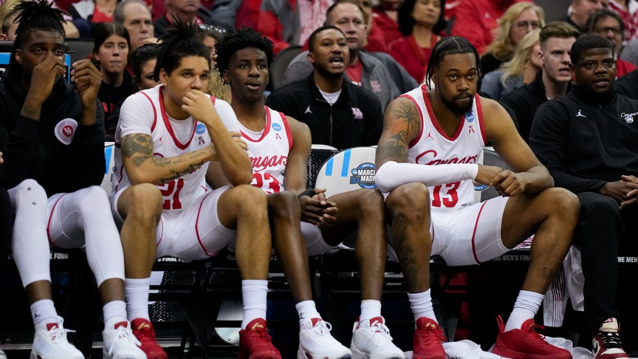 Members of the Houston team sit on the bench during their loss against Miami in a Sweet 16 college basketball game in the Midwest Regional of the NCAA Tournament Friday, March 24, 2023, in Kansas City, Mo. (AP Photo/Jeff Roberson)