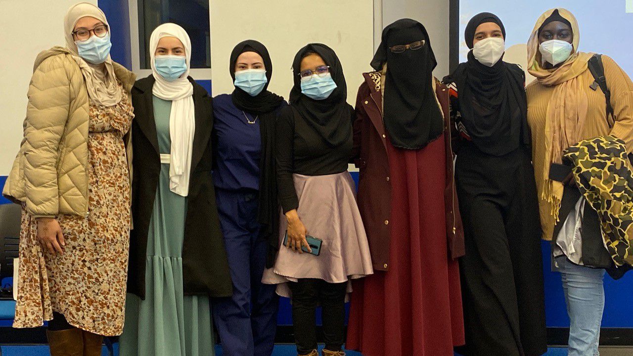 University of Kentucky Muslim Student Association members stand together after discussing misconceptions about the hijab. (Spectrum News 1/Diamond Palmer)