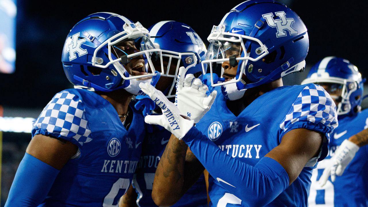 Kentucky wide receiver Tayvion Robinson (9) celebrates with wide receiver Barion Brown (2) after scoring a touchdown against Northern Illinois during the second half of an NCAA college football game in Lexington, Ky., Saturday, Sept. 24, 2022. (AP Photo/Michael Clubb)