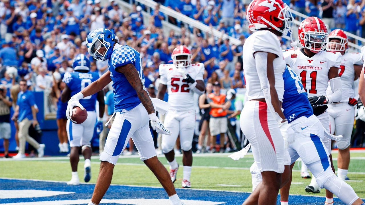 Kentucky wide receiver Dane Key, left, celebrates after scoring a touchdown during the first half of an NCAA college football game against Youngstown State in Lexington, Ky., Saturday, Sept. 17, 2022. (AP Photo/Michael Clubb)