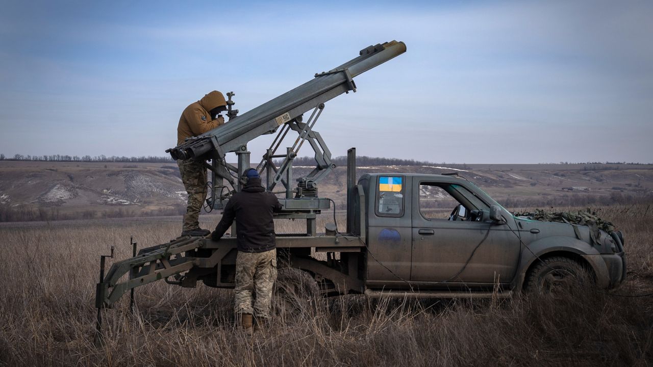 Ukrainian soldiers from The 56th Separate Motorized Infantry Mariupol Brigade prepare to fire a multiple launch rocket system towards Russian positions near Bakhmut, Ukraine, March 5, 2024. (AP Photo/Efrem Lkatsky)
