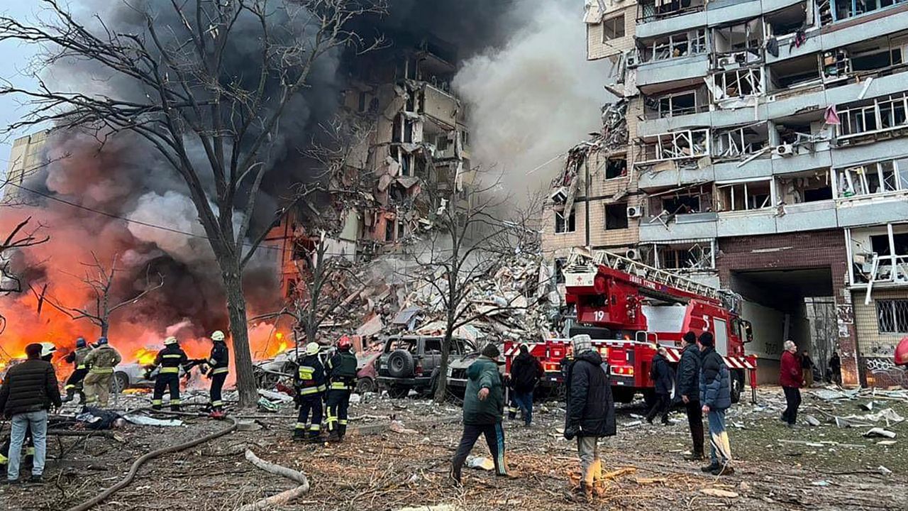 Smoke rises after a Russian rocket hit a multistory building in Dnipro, Ukraine, on Saturday, Jan. 14, 2023. (Ukrainian Presidential Press Office via AP)