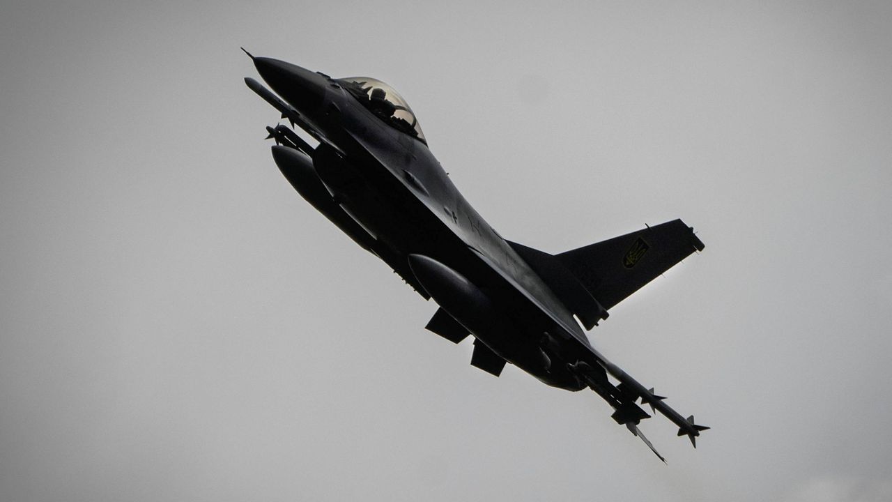 In this photo taken Sunday, Aug. 4, 2024, the Ukrainian Air Force's F-16 fighter jet flies in an undisclosed location in Ukraine. (AP Photo/Efrem Lukatsky)