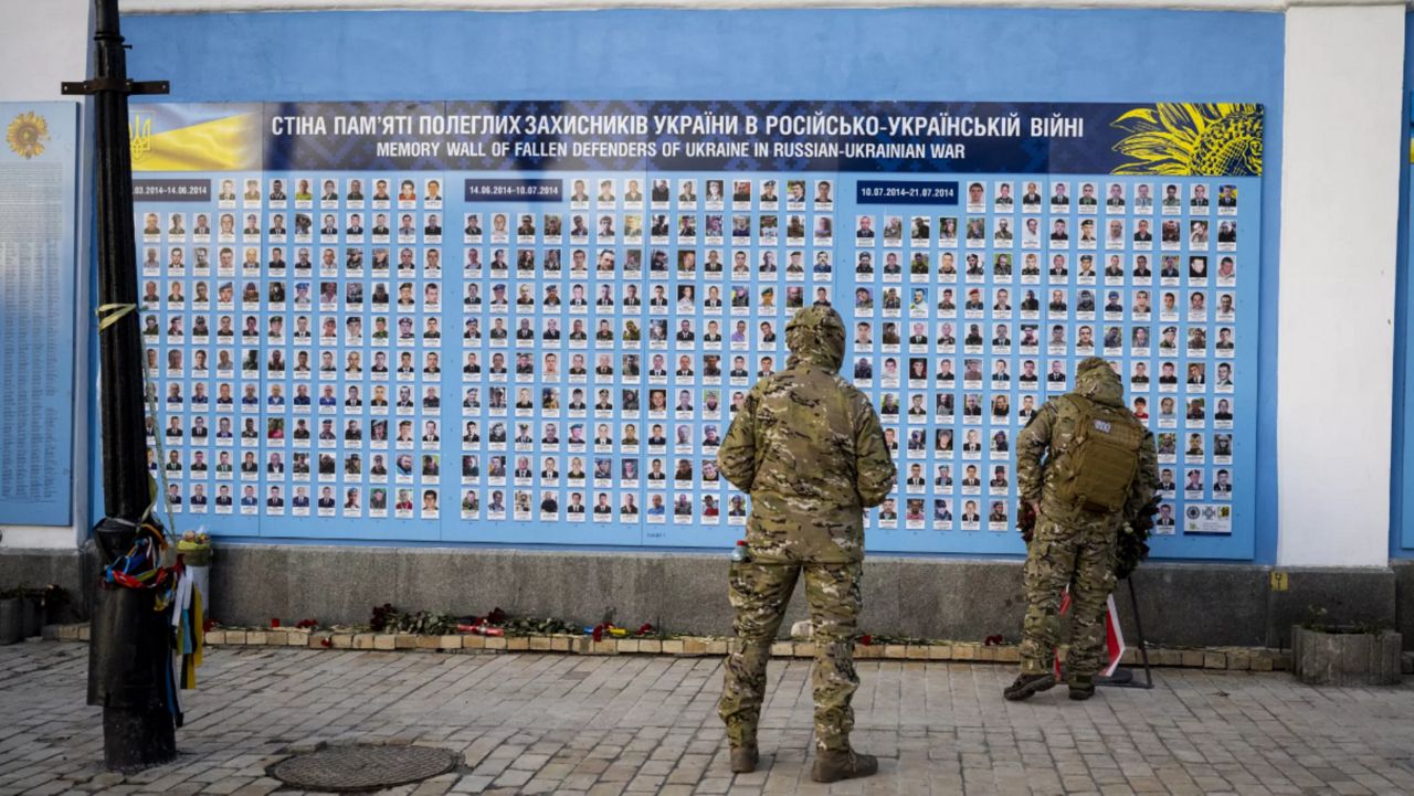 Ukrainians mark one year since war began