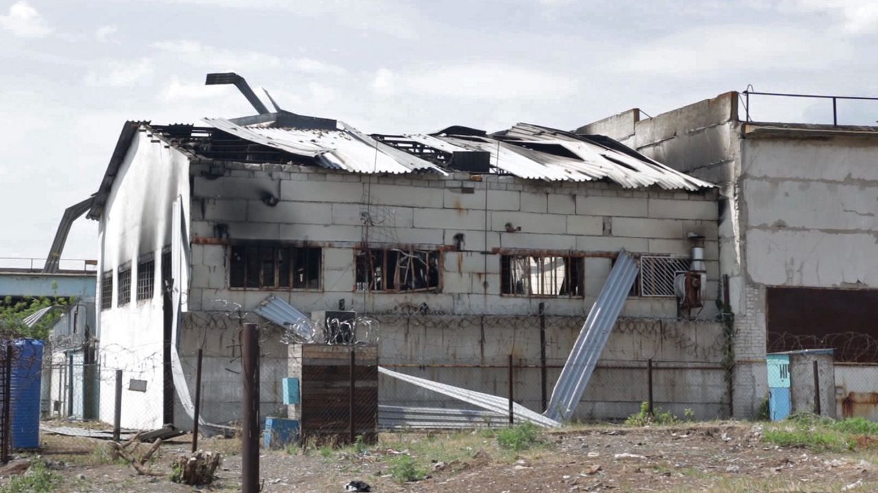 In this photo taken from video, a destroyed barrack at a prison in Olenivka can be seen in an area controlled by Russian-backed separatist forces in eastern Ukraine. (AP Photo)