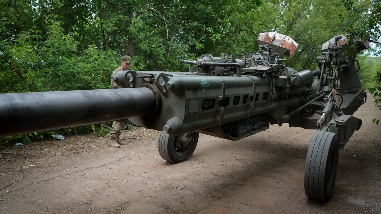 Ukrainian soldiers move a U.S.-supplied M777 howitzer into position to fire at Russian positions in Ukraine's eastern Donetsk region on June 18. (AP Photo/Efrem Lukatsky, File)