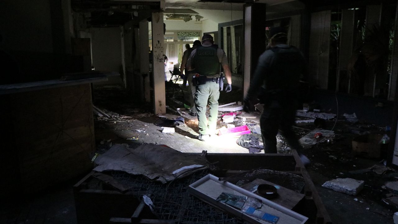 Officers from three law-enforcement agencies conducted an early-morning sweep of the condemned property and cited 10 people for trespassing. (Department of Land and Natural Resources)