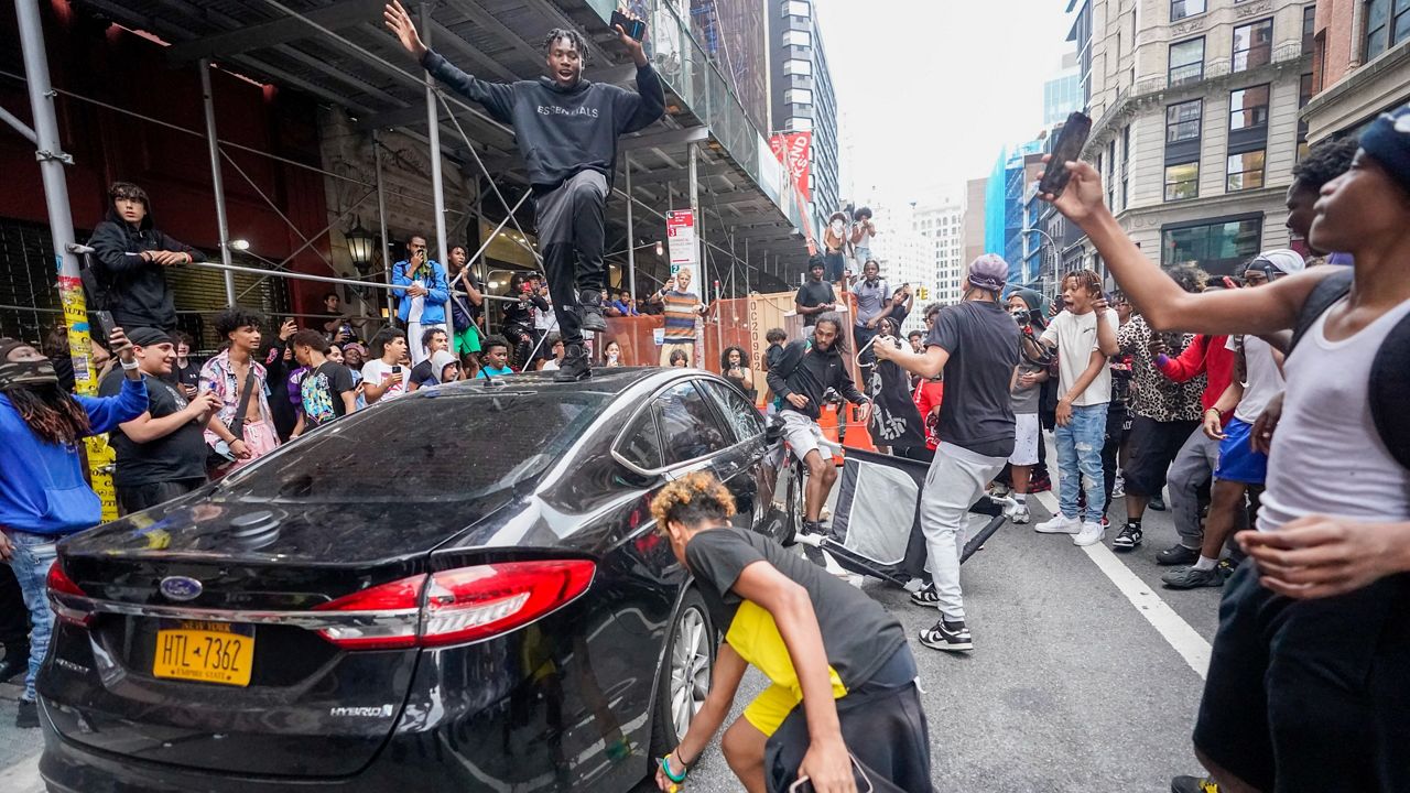 A gathering in Union Square was declared an "unlawful assembly" when individuals began to commit act of violence toward the police and public. (AP Photo/Mary Altaffer)