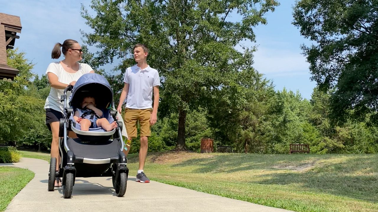 Colton Hamilton and his mom go on a walk in Union Co.