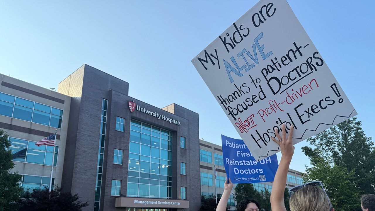 University Hospitals staff members and community members formed a picket line outside the UH Management Services Center in Shaker Heights on Friday morning. (Spectrum News 1/Chloe Magill)
