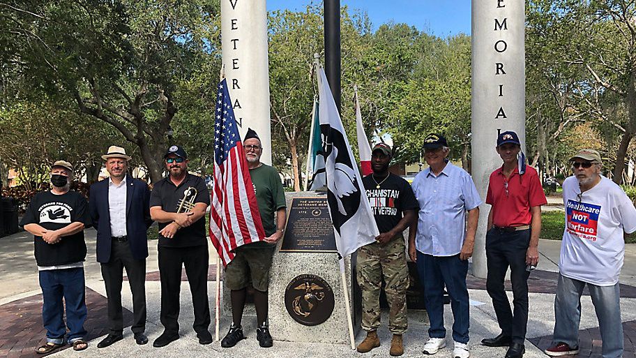 Members of Veterans for Peace and their supporters gathered at William Park in St. Petersburg on Thursday