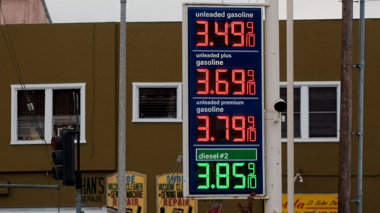 Gasoline prices are displayed at a gas station near downtown Los Angeles on Friday, May 18, 2018. Tax cuts have also left most U.S. households with more money to spend, though that extra cash has been eroded in recent weeks by sharply higher gasoline prices. (AP Photo/Richard Vogel)