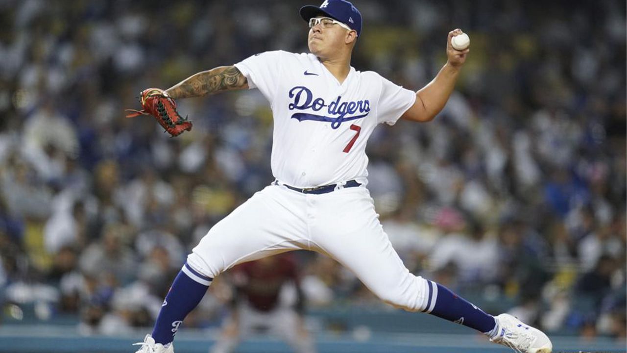 Los Angeles Dodgers starting pitcher Julio Urias (7) throws during the first inning of a baseball game against the Arizona Diamondbacks Wednesday, Sept. 15, 2021, in Los Angeles. (AP Photo/Ashley Landis)