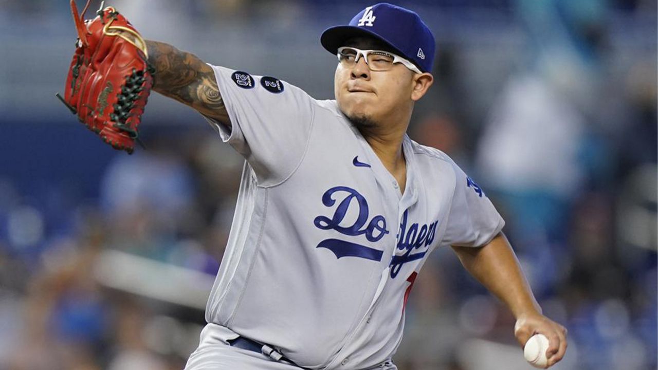 Los Angeles Dodgers' Julio Urias delivers a pitch during the first inning of a baseball game against the Miami Marlins, Thursday, July 8, 2021, in Miami. (AP Photo/Wilfredo Lee)