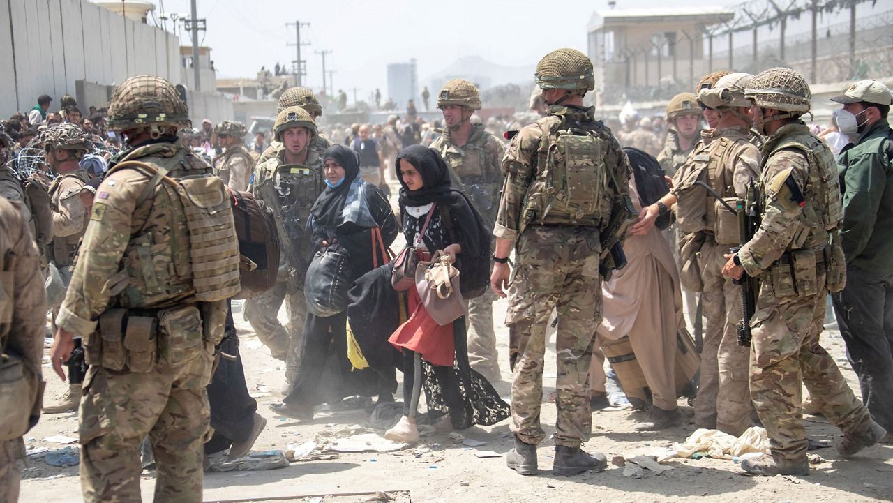 U.S. Marines assist with evacuations in Kabul. (AP Photo)