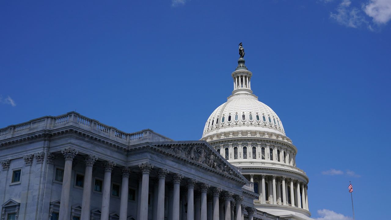 The sun shines on the dome of Capitol Hill in Washington on Friday, Aug. 12, 2022.