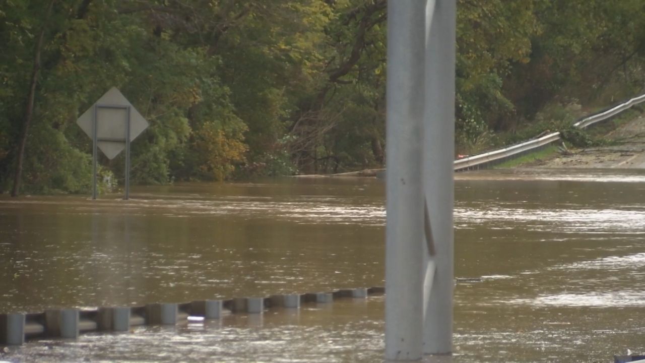 Flooded road in Buncombe County/Spectrum News 1